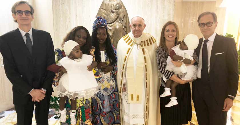 pope francis baptizes separated twins vatican baptismal surgery